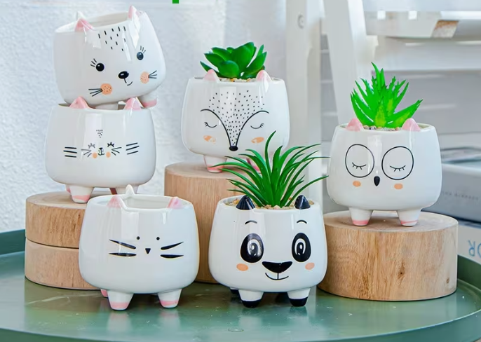 Set of cute animal-themed ceramic planters 