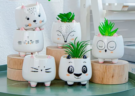 Set of cute animal-themed ceramic planters 